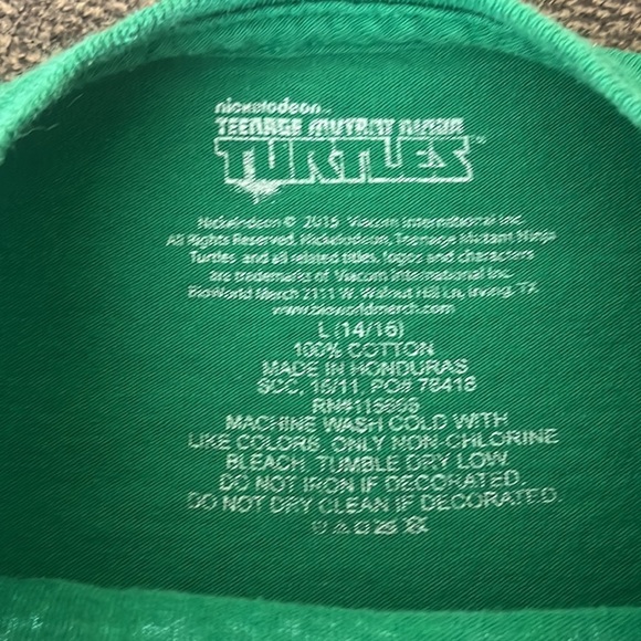 NWOT Nickelodeon Teenage Mutant Ninja.
Excellent Condition 
Green size 14/16 - Picture 5 of 7